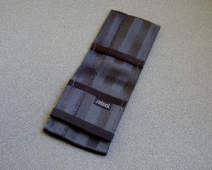 The Classic Mini has a smaller footprint than the Classic. Plus, it has an elastic band closure.