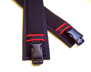 Padded straps with fancy red stripes.